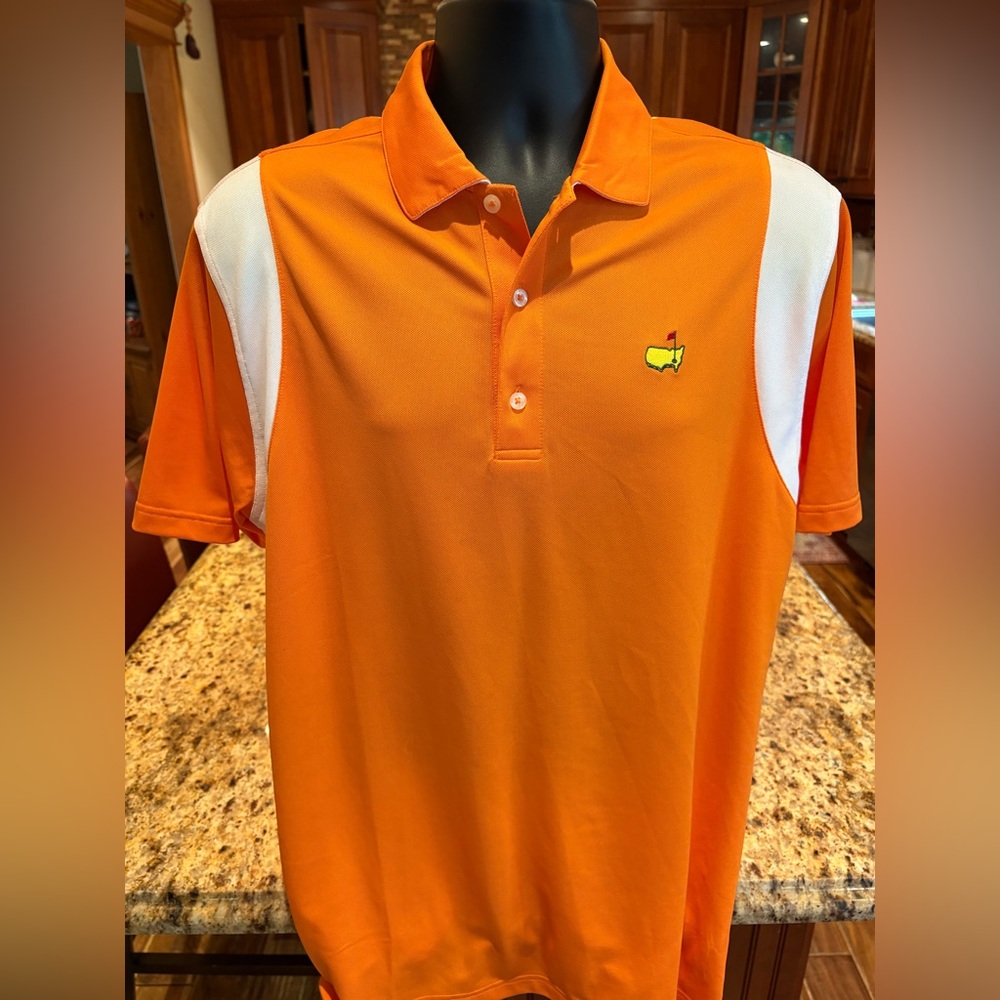“The Masters” Tournament golf polo. Sharp orange with iconic Augusta logo.‎